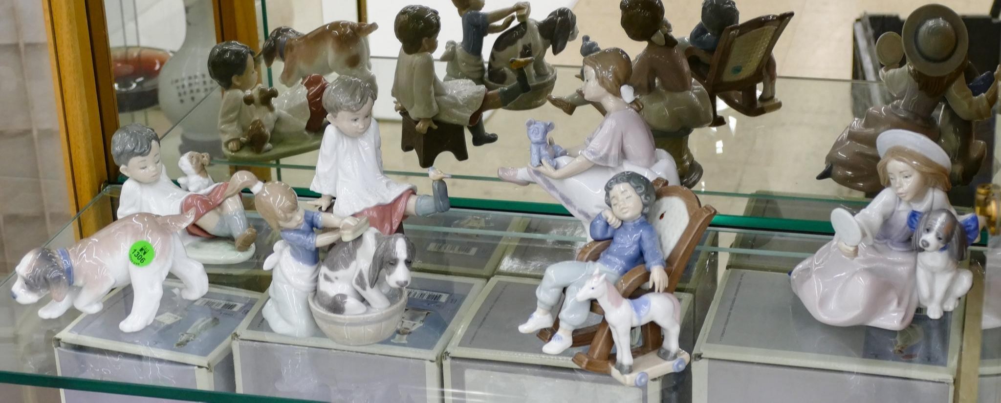 Appraisal: pc Lladro Porcelain Children and Dog Porcelain Figurines with Boxes