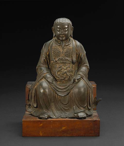 Appraisal: A cast bronze figure of Zhenwu Ming Dynasty The Daoist