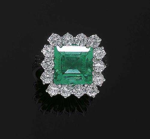 Appraisal: EMERALD AND BRILLIANT-CUT DIAMOND RING White gold Very elegant classic