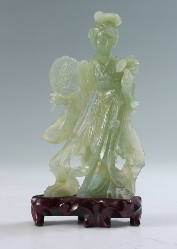 Appraisal: CHINESE CARVED SERPENTINE MAIDEN FIGURE Carved from serpentine or similar