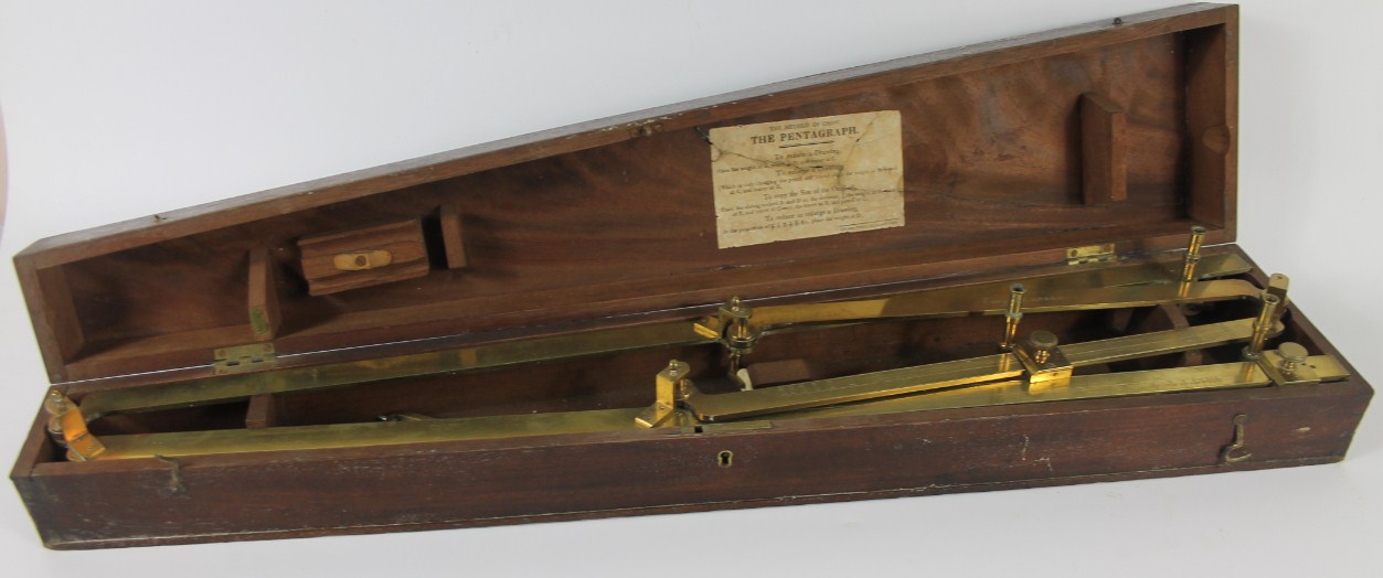 Appraisal: A flamed mahogany cased brass pantograph by Cary of London