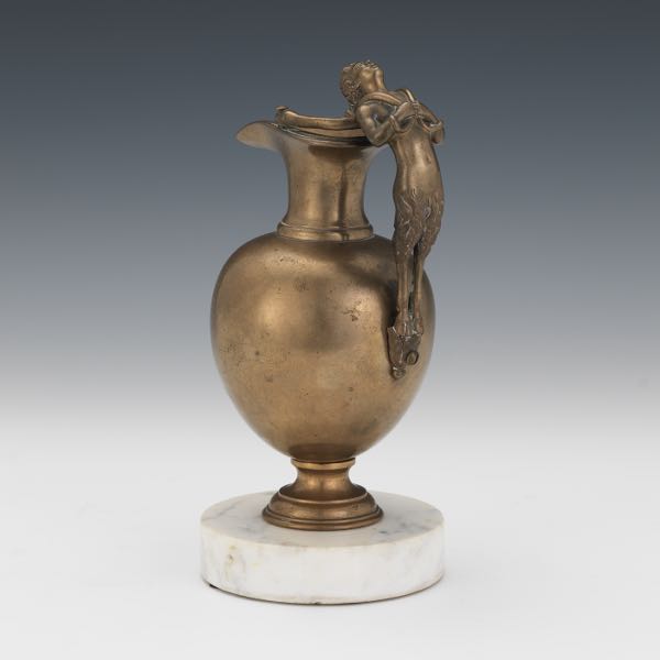 Appraisal: ITALIAN SILVERED BRONZE EWER ON MARBLE BASE With pronounced spout