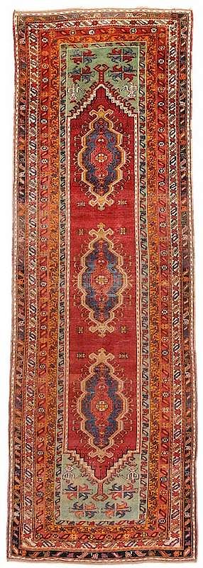 Appraisal: Caucasian Gallery Rug late th early th century hooked edge