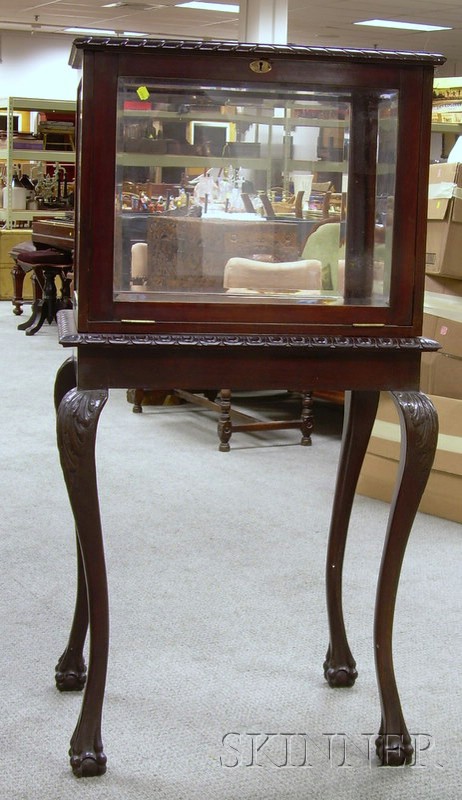 Appraisal: Chippendale-style Carved Mahogany Display Stand with Beveled Glass ht lg