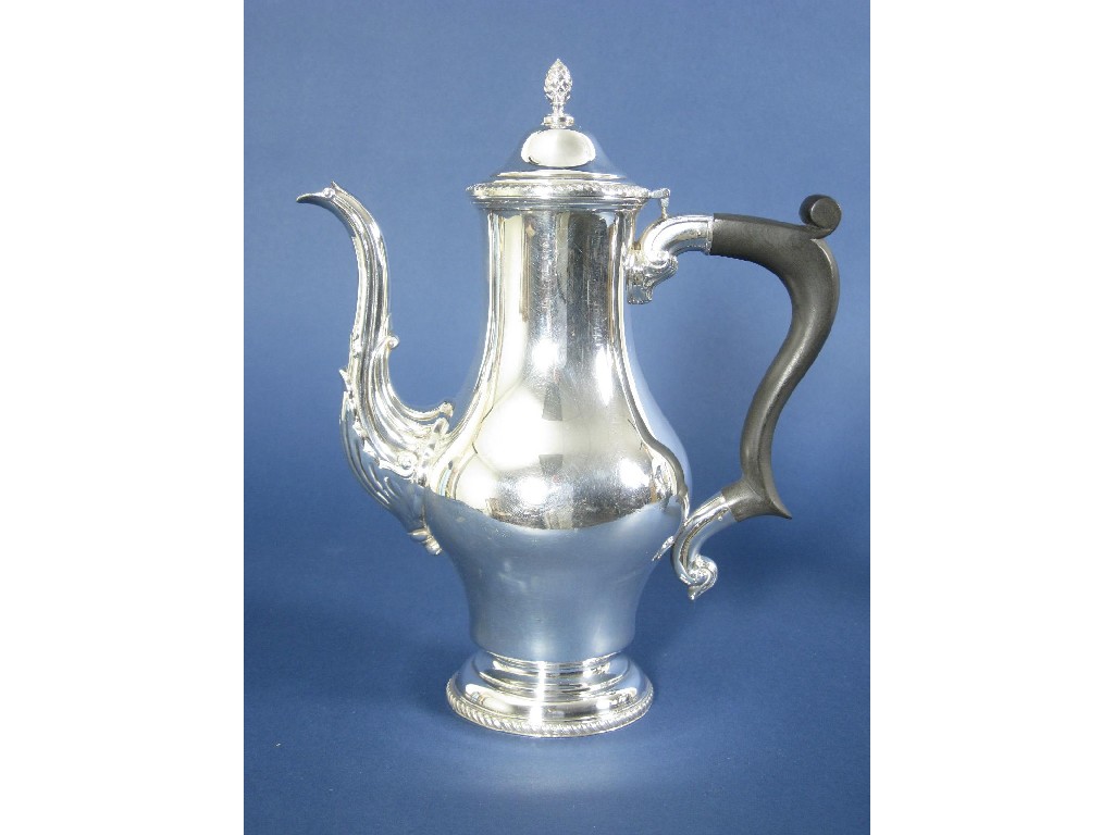 Appraisal: A modern baluster Coffee Pot with gadroon rims pineapple finial