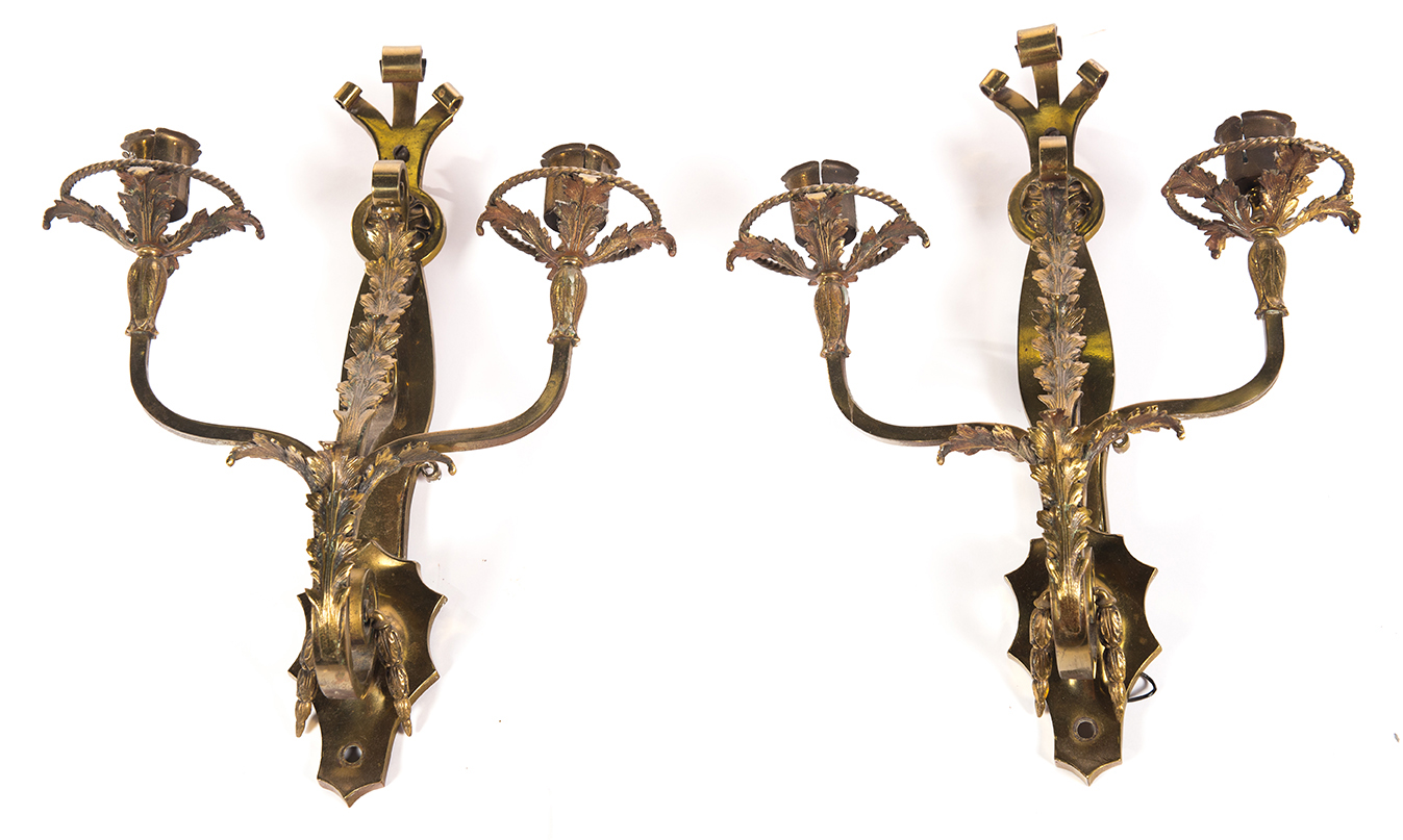 Appraisal: PAIR OF HEAVILY CAST BRASS WALL SCONCES American ca Each