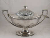 Appraisal: A large two handled silver plated soup tureen in the