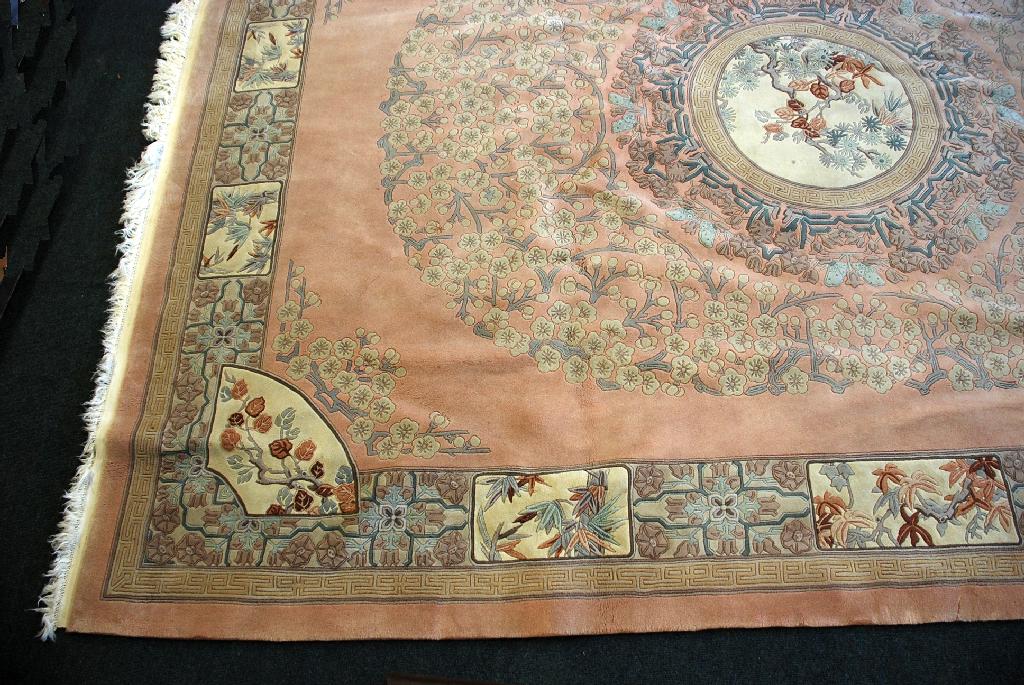 Appraisal: WASHED CHINESE LARGE CARPET the pale pink field with central