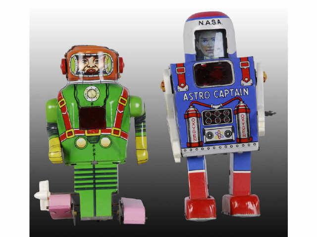 Appraisal: Lot of Wind-Up Japanese Astronaut Toys Description Both working Includes