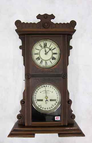 Appraisal: WALNUT CASED DOUBLE-DIAL CALENDAR SHELF CLOCK Waterbury Clock Co Waterbury