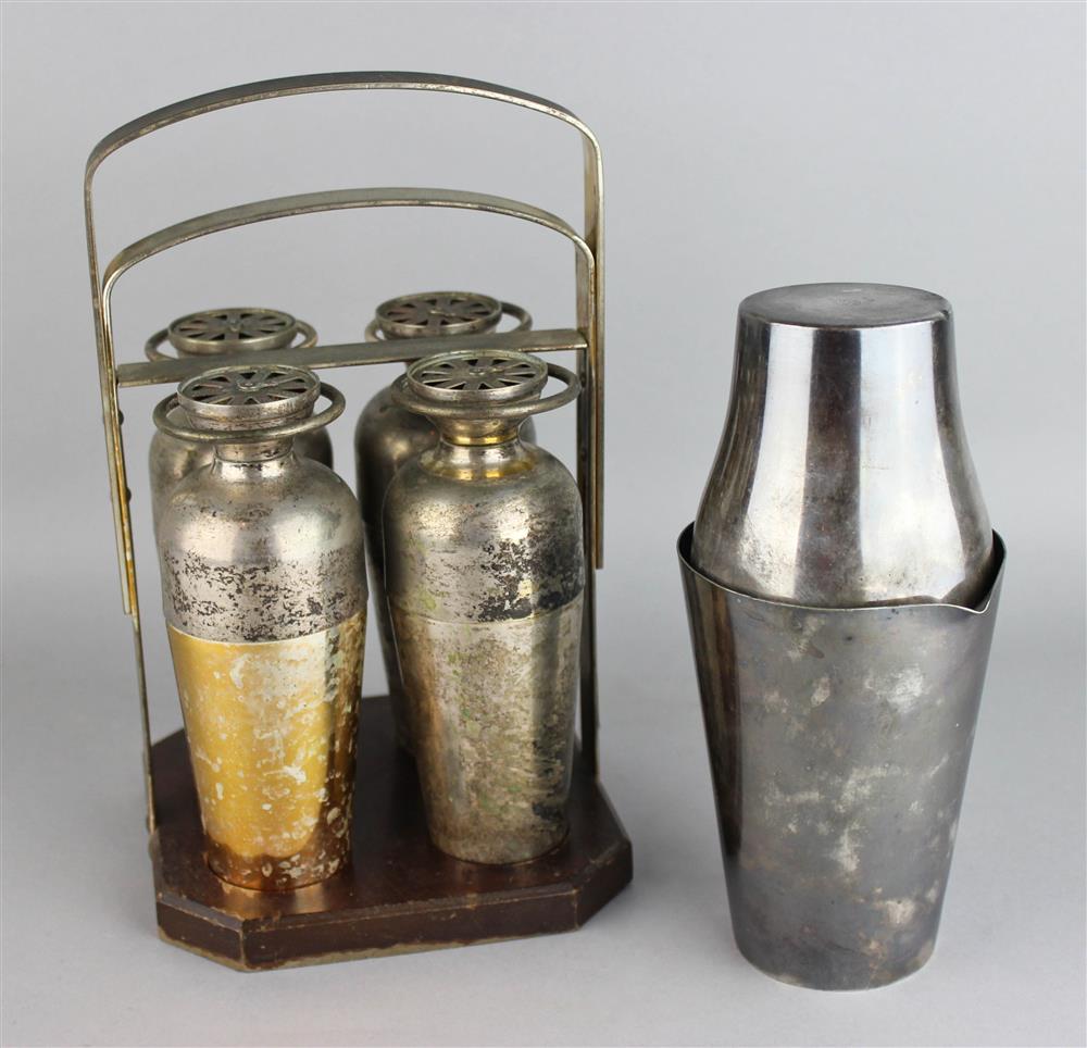 Appraisal: NAPIER SILVERPLATED NOVELTY COCKTAIL CADDY including four two-piece shakers with