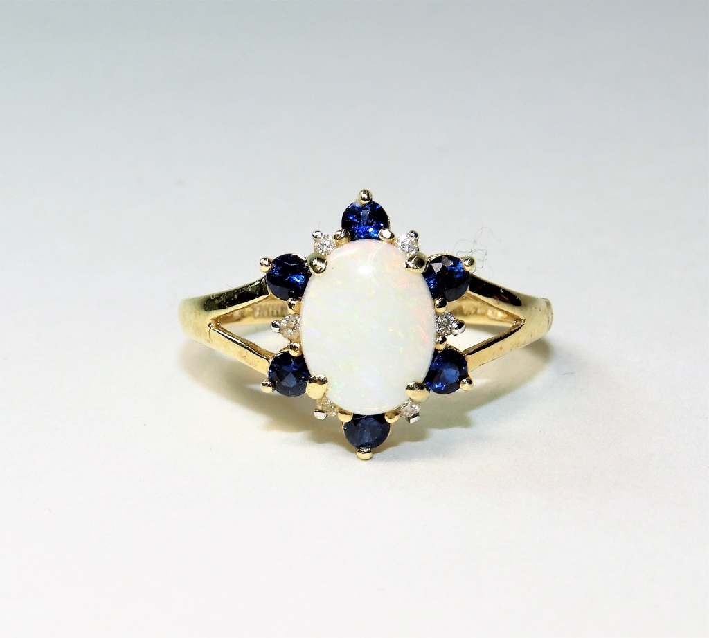 Appraisal: ESTATE K GOLD OPAL DIAMOND SAPPHIRE LADY'S RING China th