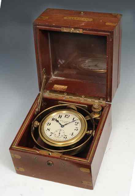 Appraisal: AN EARLY TH CENTURY WALTHAM SHIPS CHRONOMETER the silvered dial