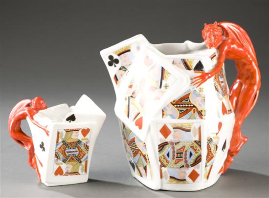 Appraisal: Royal Bayreuth devil playing cards pitcher and creamer Each with