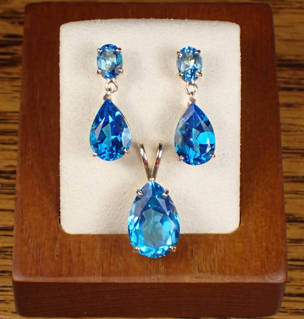 Appraisal: BLUE TOPAZ PENDANT AND DANGLE EARRINGS including a k yellow