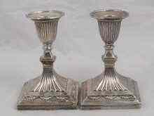 Appraisal: A pair of Victorian silver dwarf candlesticks Sheffield approx cm