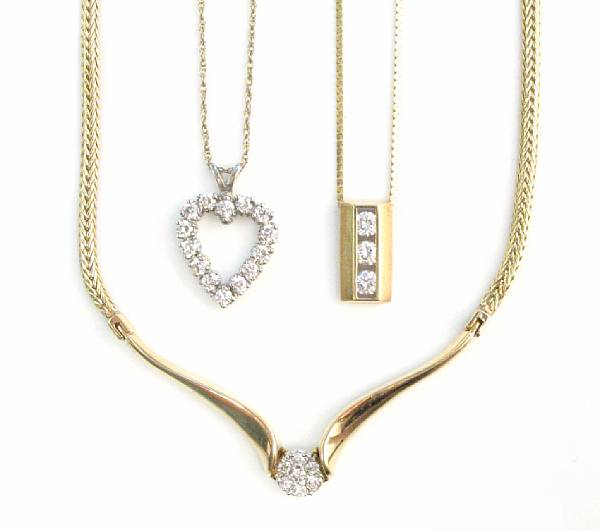 Appraisal: A collection of three diamond and fourteen karat gold necklace