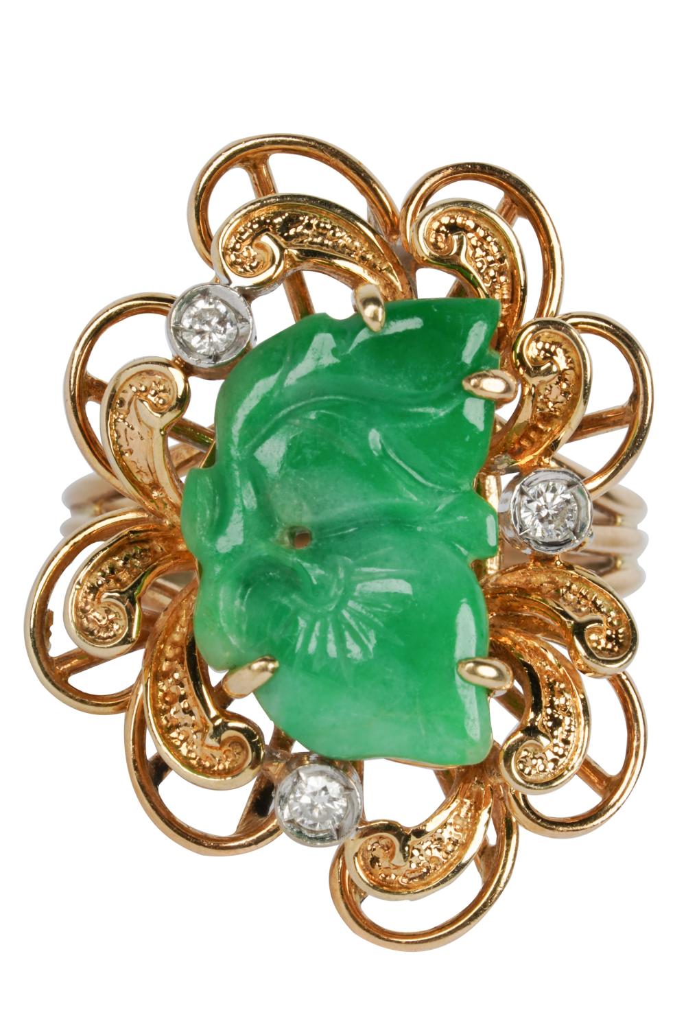 Appraisal: KARAT YELLOW GOLD JADE DIAMOND RINGcentering one carved jadeite jade