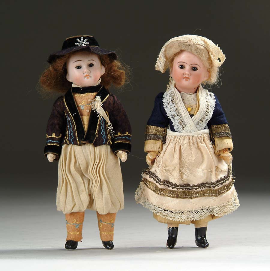 Appraisal: PAIR OF s FRENCH DOLLS SFBJ-era dolls in regional costumes