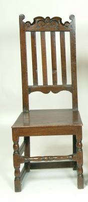 Appraisal: AN OAK HIGH BACK SIDE CHAIR late th century the