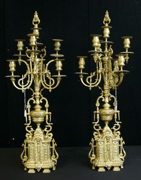 Appraisal: A pair of gilt metal seven branched candelabra in Baroque