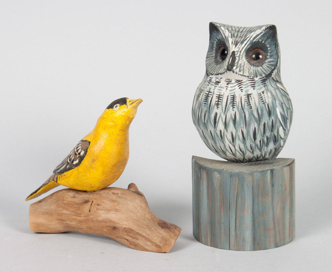 Appraisal: Two carved and polychromed wood bird figures by Frank Townsend