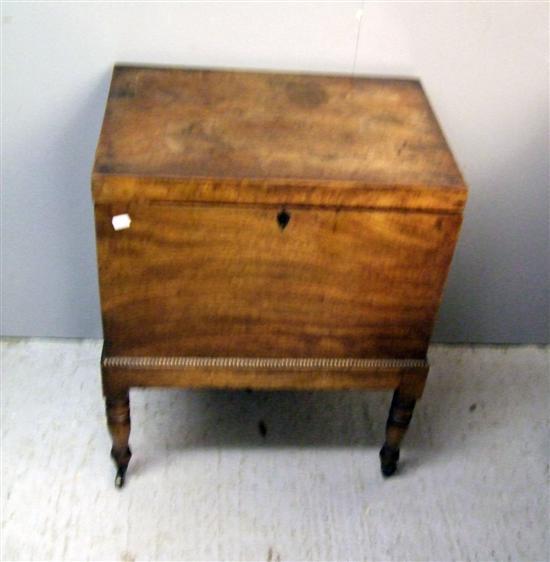 Appraisal: th century mahogany rectangular cellarette with hinged cover fitted interior