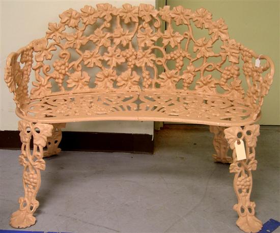 Appraisal: Cast iron garden settee with elaborate pierced grapevine and cluster