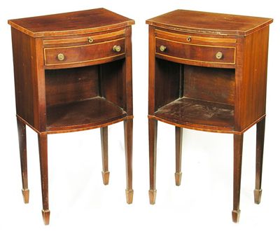 Appraisal: A pair of mahogany bedside tables inlaid boxwood stringing each