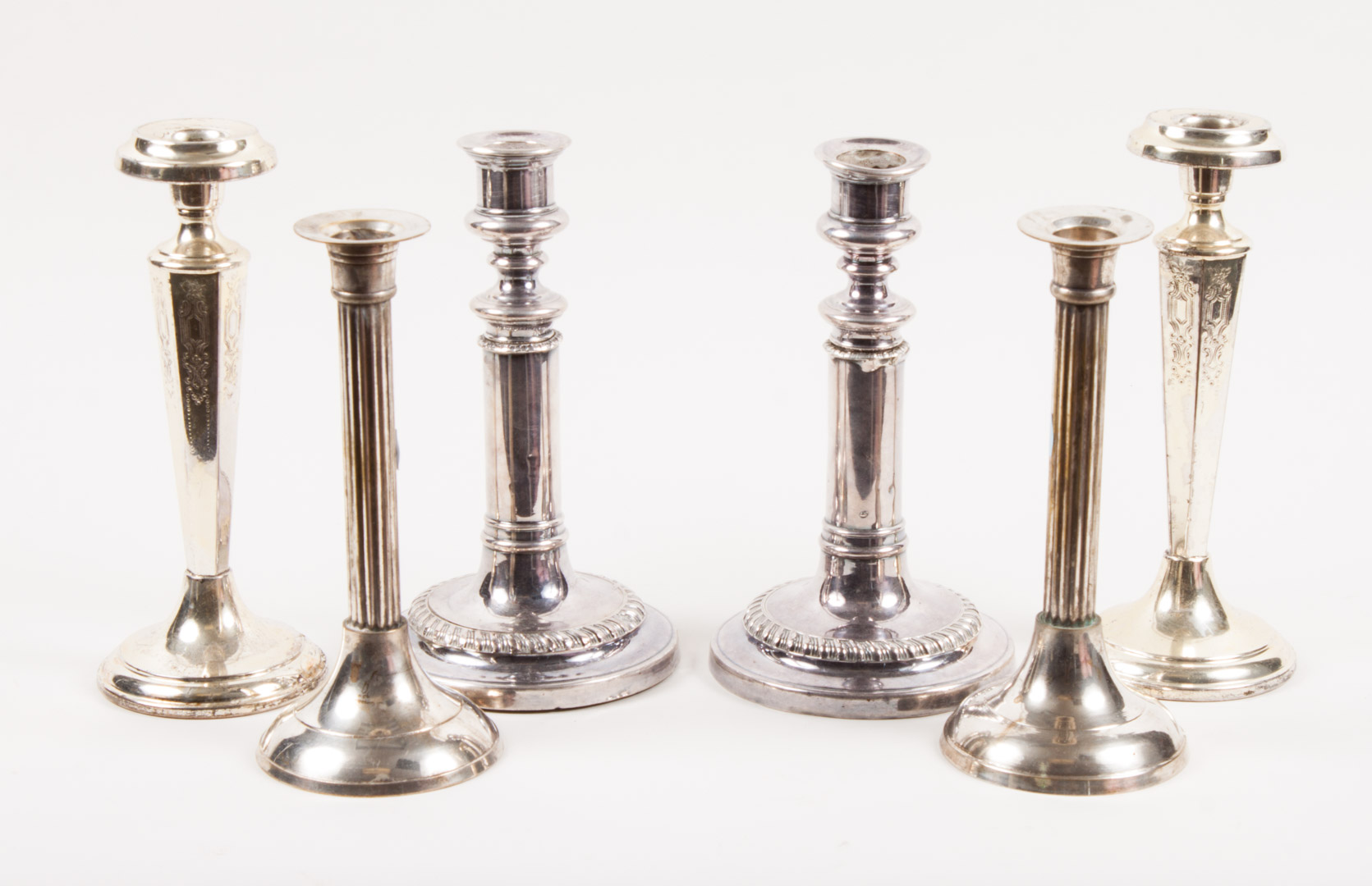 Appraisal: Three pairs of silver-plated candlesticks tallest - in H