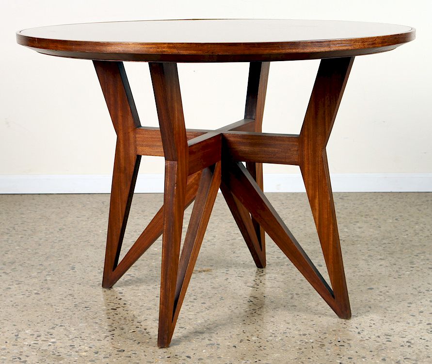 Appraisal: MAHOGANY GLASS TOP CENTER TABLE MANNER ICO PARISI A mahogany