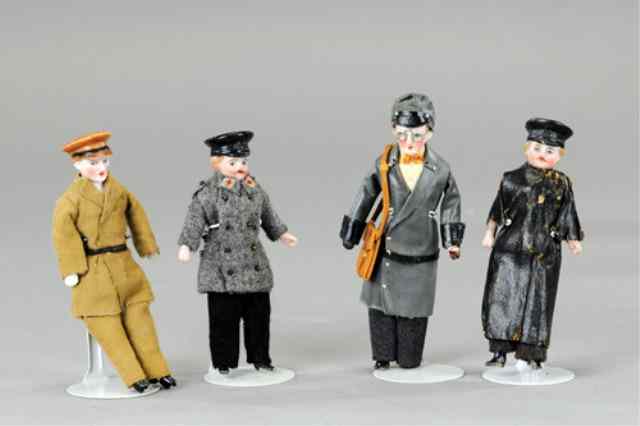 Appraisal: MINIATURE BISQUE HEAD FIGURES Lot of four figures with varied