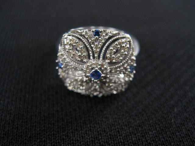 Appraisal: Sapphire Diamond Ring five blue sapphires and lots of diamonds