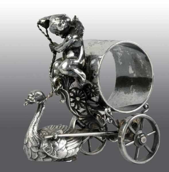 Appraisal: Cherub with Reins to Swan Napkin Ring Condition Excellent Size