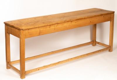 Appraisal: A pine serving table on square legs united by square