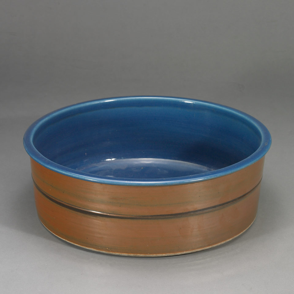 Appraisal: Large Blue and Amber Basin With cobalt blue glaze covering