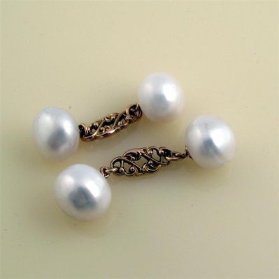 Appraisal: A pair of cultured pearl and gold cuff links