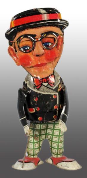 Appraisal: Tin Marx Harold Lloyd Walker Wind-Up Toy Description American Working