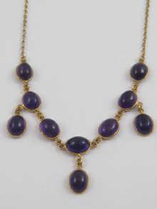 Appraisal: A yellow metal tests carat gold cabochon amethyst necklace Approx