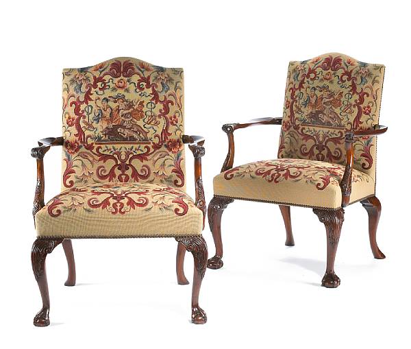 Appraisal: A pair of George III style mahogany library chairs Both