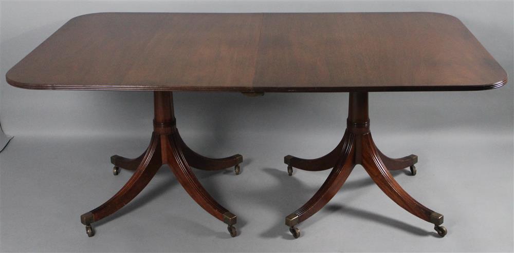 Appraisal: REGENCY STYLE MAHOGANY TWO PEDESTAL TABLE WITH TWO LEAVES the