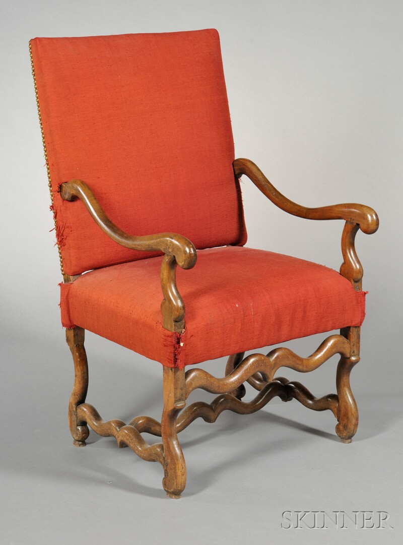 Appraisal: Georgian-style Mahogany Library Chair th century upholstered with shaped armrests