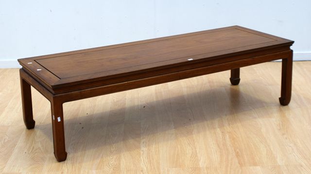 Appraisal: A fruitwood rectangular coffee table cm long cm wide cm