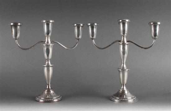 Appraisal: Pair of similar American weighted sterling silver three-light candelabra Crown