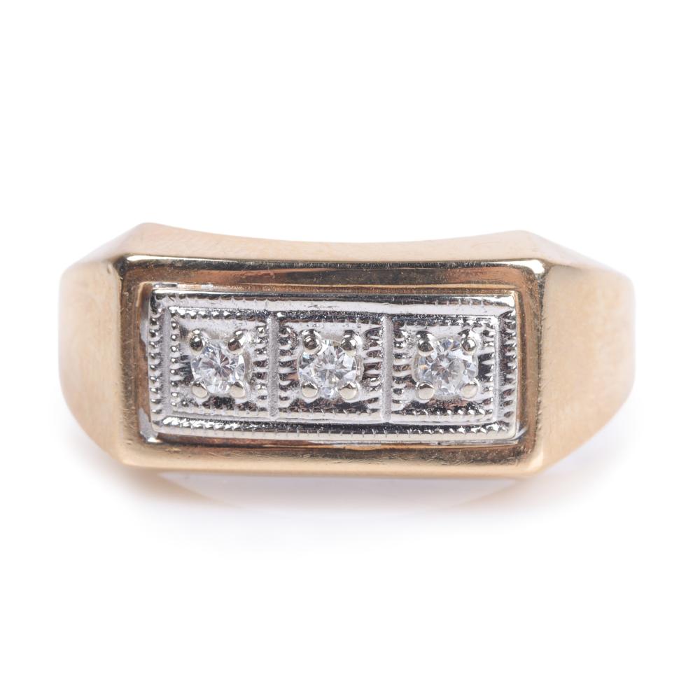 Appraisal: K two tone gold diamond statement ring featuring three small