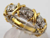 Appraisal: An carat gold platinum and diamond eternity ring designed by