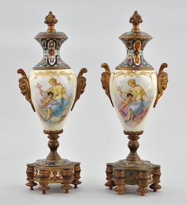 Appraisal: A Pair of French Signed Porcelain and Champleve Enamel Urns