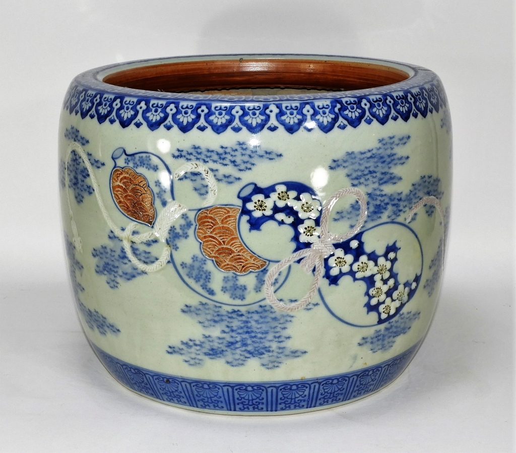 Appraisal: JAPANESE BLUE WHITE PORCELAIN INCISED JARDINIERE Japan th CenturyDecorated with