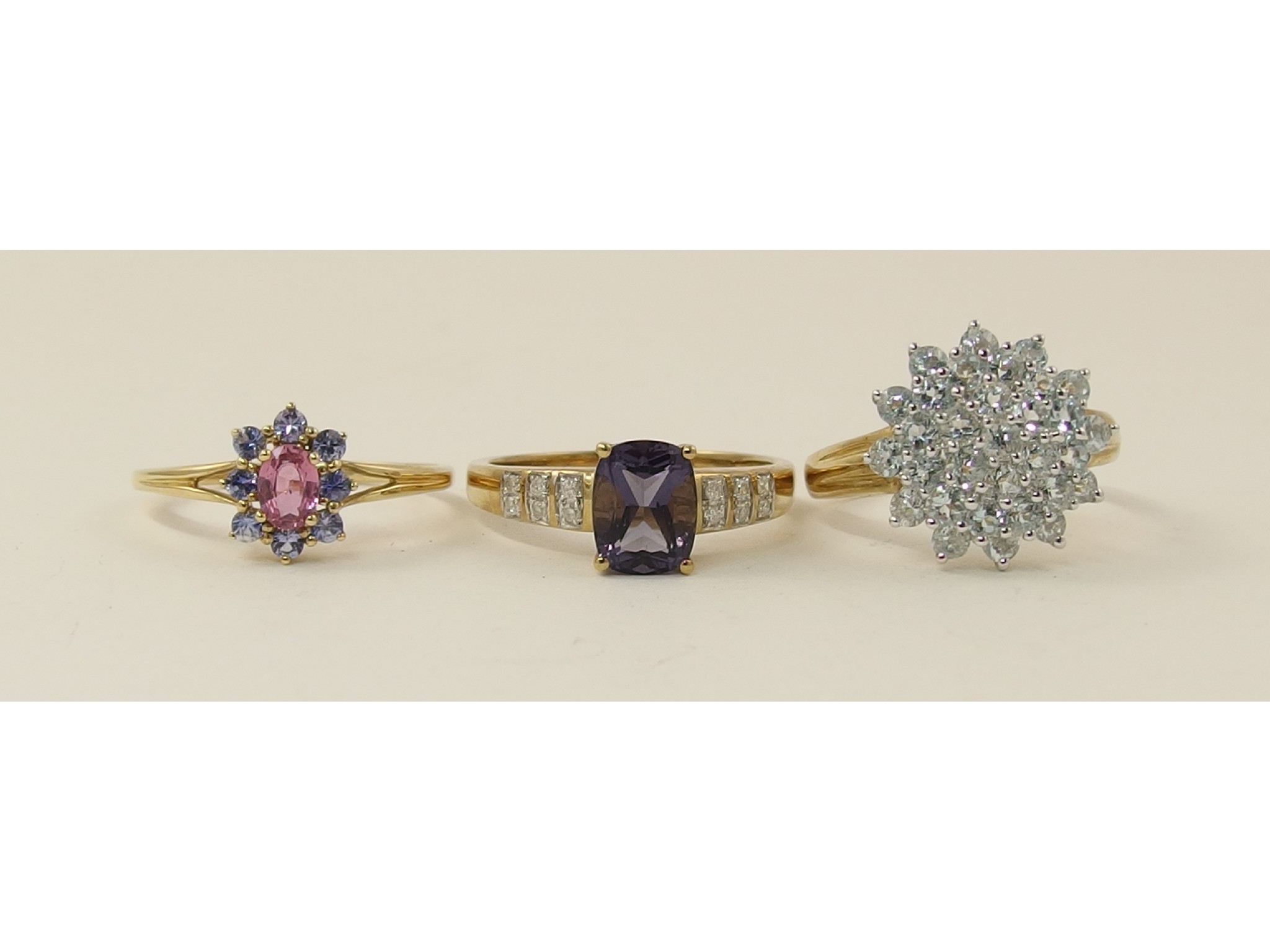 Appraisal: A ct amethyst and diamond ring together with two other