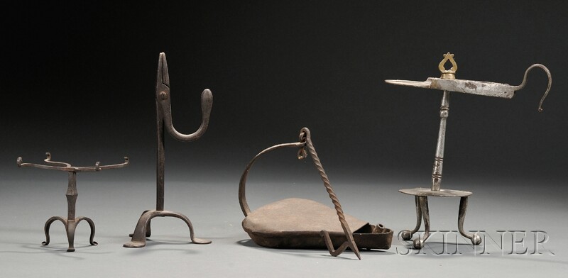 Appraisal: Four Early Wrought Iron Lighting Implements th century a rush